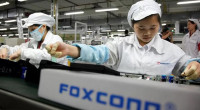 iPhone maker sees revenue slump as demand weakens