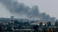 Israeli forces shell tent camp in Rafah, killing 21 civilians