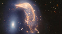 NASA releases Webb telescope photos of entwined galaxies
