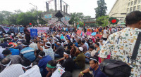 Outsourcing workers block Shahbagh for job nationalisation