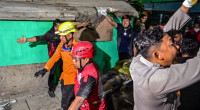School collapse in Indonesia kills three, leaves dozens missing