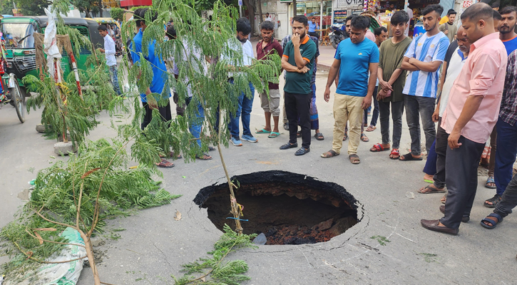 ধানমন্ডিতে সড়কে গর্ত নিয়ে কৌতূহল, যা জানা গেল